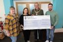 Outgoing mayor Cllr Peter Coan presents a grant to, from left, Sarah Pownall, Lucy Beesley and Nick Sherburn of The Welcome
