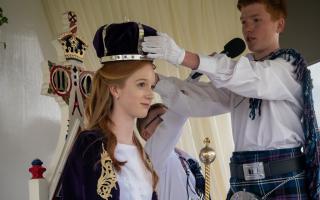 Orla Bolton is crowned Knutsford May Queen by crown bearer Jack Pearce