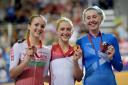 Wales' Elinor Barker, left, with winner Laura Trott, centre, and bronze medallist Katie Archibald