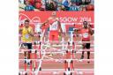Andy Turner, centre, crashes out of his heat in the 110m hurdles. Picture courtesy of press Association.