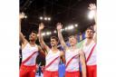 England's Louis Smith, Max Whitlock, Nile Wilson and Kristian Thomas wave to the crowd after scoring a total of 266.804. Picture courtesy of Press Association