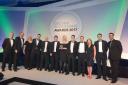 Staff from Dunelm receive award from Marcus Brigstock