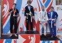 Lucas Lee, far right, with the bronze medal he won at the Junior National Championships