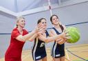 Netball players from Knutsford Academy with Redrow's Rachael Reece