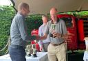 Richard Okill receives a trophy for winning the Premier Berry at Over Peover Gooseberry Show
