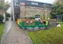 Work being carried out in library gardens is part of the ongoing repair to the sink hole on Toft Road