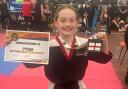 Alana Fagan with her silver medal and certificate from the WKKC English Championships on Sunday