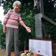 Ann Venables, deputy warden of St Peter's at the war memorial Pictures: Bernard Tuck
