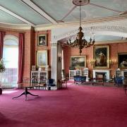 The new burgundy carpet fitted in the gallery at Tabley House