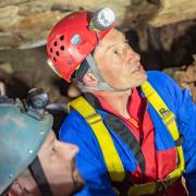 Archaeologist Jamie Lund and caving club leader Ed Coghlan explore mines below Alderley Edge