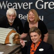 Ian Daniells, chairman of Lower Moss Wood, Lynne Duxbury, Bellway sales manager with member of staff from the Weaver Green development