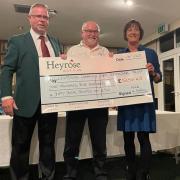 Nick Shennan, outgoing Heyrose Golf Club captain, Adrian Rees, chairman Knutsford Community First Responders Trust Kathy Smith, outgoing ladies captain