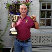 Champion gooseberry grower Jim Hart celebrates winning the Crown  of Peover Gooseberry Show