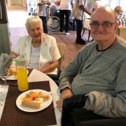 Residents enjoy an afternoon tea party at Hazelmere House