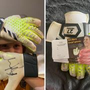 A pair of gloves worn and signed by England goalkeeper Earps, sent by Manchester United to Tarporley Primary School who are selling tickets for a raffle to raise more than £10,000 for a new sports track