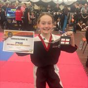 Alana Fagan with her silver medal and certificate from the WKKC English Championships on Sunday