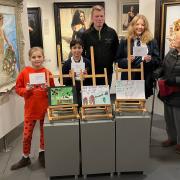 From left, winners Lucie Jandufova, Simon Wagle and Lucy Melia with John Sheldon, Sheldon's Dairy, and Margaret Cole from Knutsford Litter Free