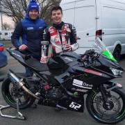 Alfie Jenkinson celebrates his recent Oulton Park success with father Adam, who is a former British Superbikes racer
