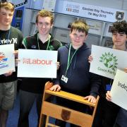 Candidates with returning officer Bill Armstrong-Mortlock, centre. From left, Alex Longman, William Raven, Callum Waters, Benjamin Griggs and Matthew Watson