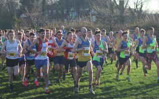 Richard Coen, centre in vest number 448, was first to finish for Wilmslow Running Club in the Cheshire Cross Country Championships senior men's race