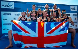 Tom Ford and his men's eight crewmates celebrate their gold medal