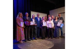 From left, Nicola Marshall, Doug Baker, Val Bryant, Cllr Peter Coan, Ian Cass, Maggie Clayton, John Long, Ann Long and Andrew Malloy at the Town Awards ceremony