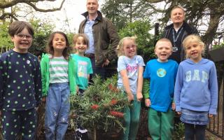 From left, rear, Cllr Anthony Harrison and Steve Wheeldon, Aspire Education Trust assistant chief executive officer,  celebrate Earth Day with pupils at Peover Superior Primary School