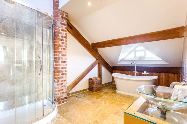 A stunning ensuite leads off the master bedroom