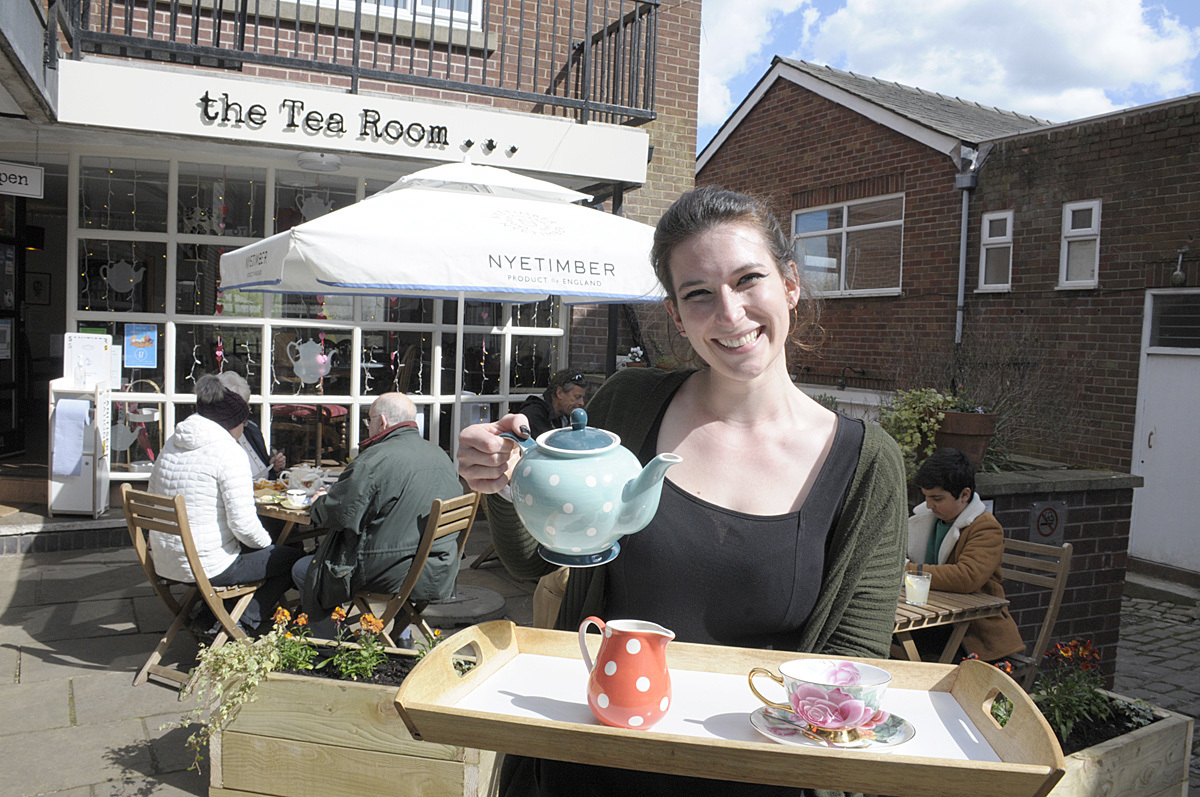 Harriet Henry serves customers outdoors at The Tea Room - Picture by Mike Boden