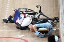 Great Britain's Laura Kenny after a crash during the Women's Omnium Scratch Race 1/4 at the Izu Velodrome on the sixteenth day of the Tokyo 2020 Olympic Games in Japan. Picture: PA