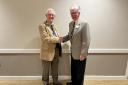 John Beaumont, new chairman of Knutsford Rex Probus Club congratulated by club president Richard Fenby