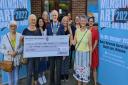 Wilmslow Art Under One Roof receives a community grant of £1,652 from Cllr Frank McCarthy, chairman of Wilmslow Town Council