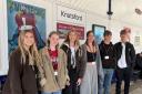 Knutsford Academy students, from left, Imogen Braun, Izzy Jackson, Becky Nixon, Caitlin Bergin, Shaun Fleming and Will Young with some of their posters at Knutsford railway station