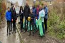 Friends of St John's Wood collect bags of rubbish during an autumn litter pick