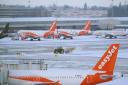 Manchester Airport has reopened after heavy snow forced both runways to close