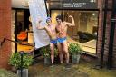 Personal trainers Chris Nicklin and Luca Lattuada brave sub zero temperatures wearing only speedos and bobble hats to raise funds and awareness for Prostate Cancer UK