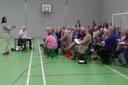 Around 100 people attended a public meeting to express their concern over controversial plans to build 225 homes on  a Knutsford nature reserve