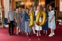 Knutsford Hosts celebrate 10th anniversary in the splendid state rooms at Tabley House