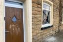 Padiham property targeted by vandals again as windows and door smashed