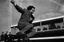 Lancashire comedian-singer Ken Dodd leaping for joy with the news that his record 