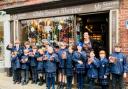 Young entrepreneurs from Yorston Lodge Preparatory School with sweets they plan to sell with help from Julia Chard at Mr Simms Olde Sweet Shoppe