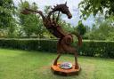 A sculpture of a rearing war horse pays tribute to fallen soldiers who served with the Cheshire Yeomanry to mark the regiment's 225th anniversary