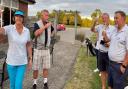 Jubilant golfers Kathy Smith and Nick Shennan raise a toast with Pete Smith and Tony Gear after completing the gruelling challenge