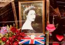 This photograph of the Queen at Mr Simms  Olde Sweet shop is one many royal tributes displayed by businesses in Knutsford  Pictures: John Horsley