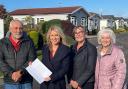 Park home residents Patrick Featherston, Julia Griffiths, Chris Lloyd with Esther McVey