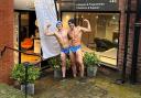 Personal trainers Chris Nicklin and Luca Lattuada brave sub zero temperatures wearing only speedos and bobble hats to raise funds and awareness for Prostate Cancer UK