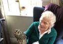 Jackie Brown is fascinated to hold an owl on her hand