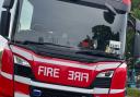 Firefighters have put out a caravan which had been set on fire 