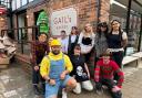 A team preparing to open GAIL’s bakery in Knutsford joins in some Halloween fun