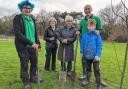 From left, Adam Keppel-Green, Jan McCappin, Jacquie Grinham, Andrew Malloy and son Luis planting trees on the Barncroft